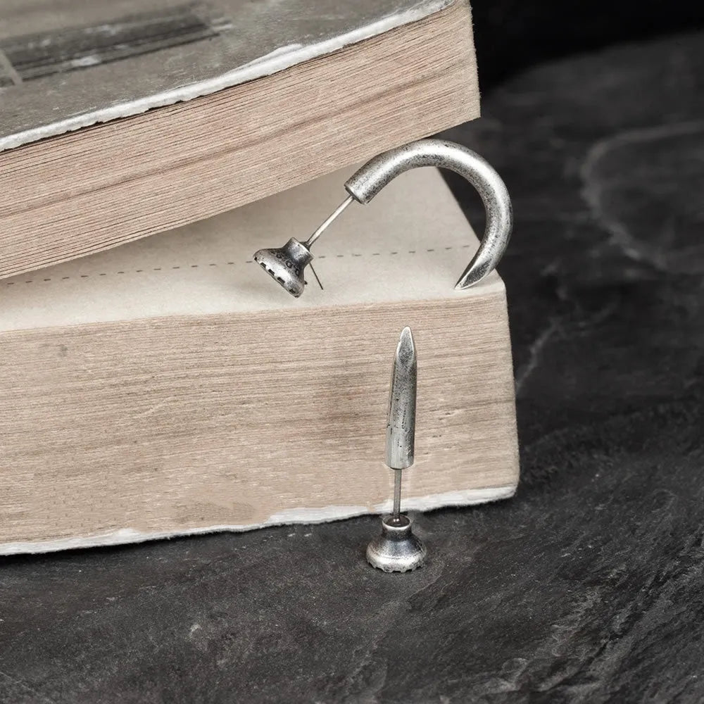 S925 sterling silver punk stud earring in straight and curved retro nail designs.