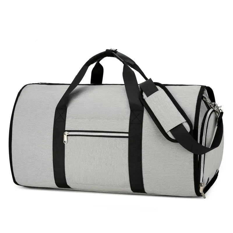 Grey Oxford cloth sports bag showing separate compartments for dry and wet storage items