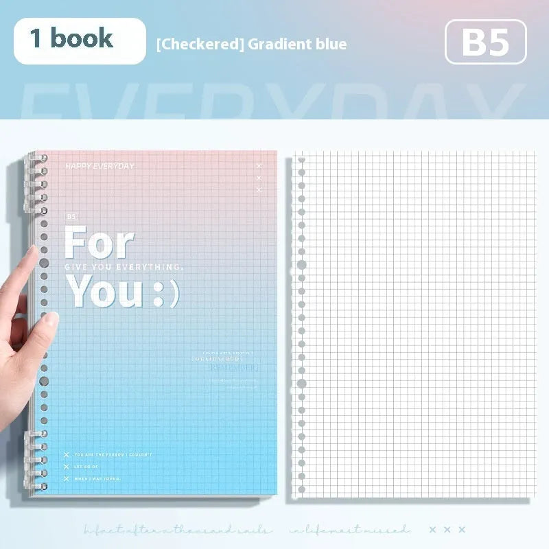 Removable coil gradient notepad in blue, green, pink, or purple with grid paper.