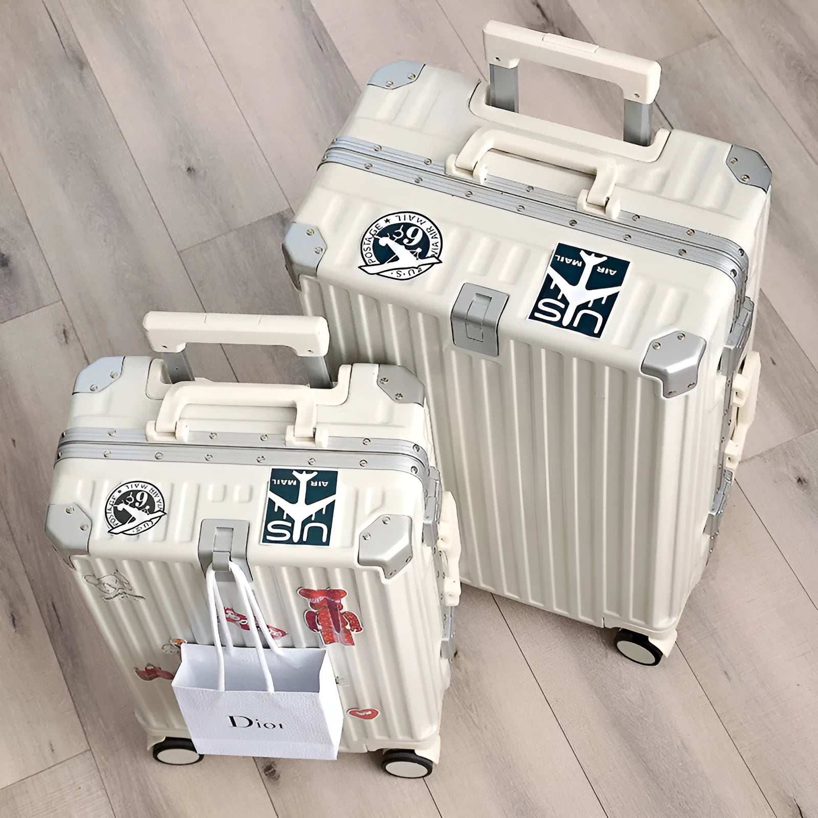 Hard shell aluminium frame luggage in avocado green with USB port and universal wheels.
