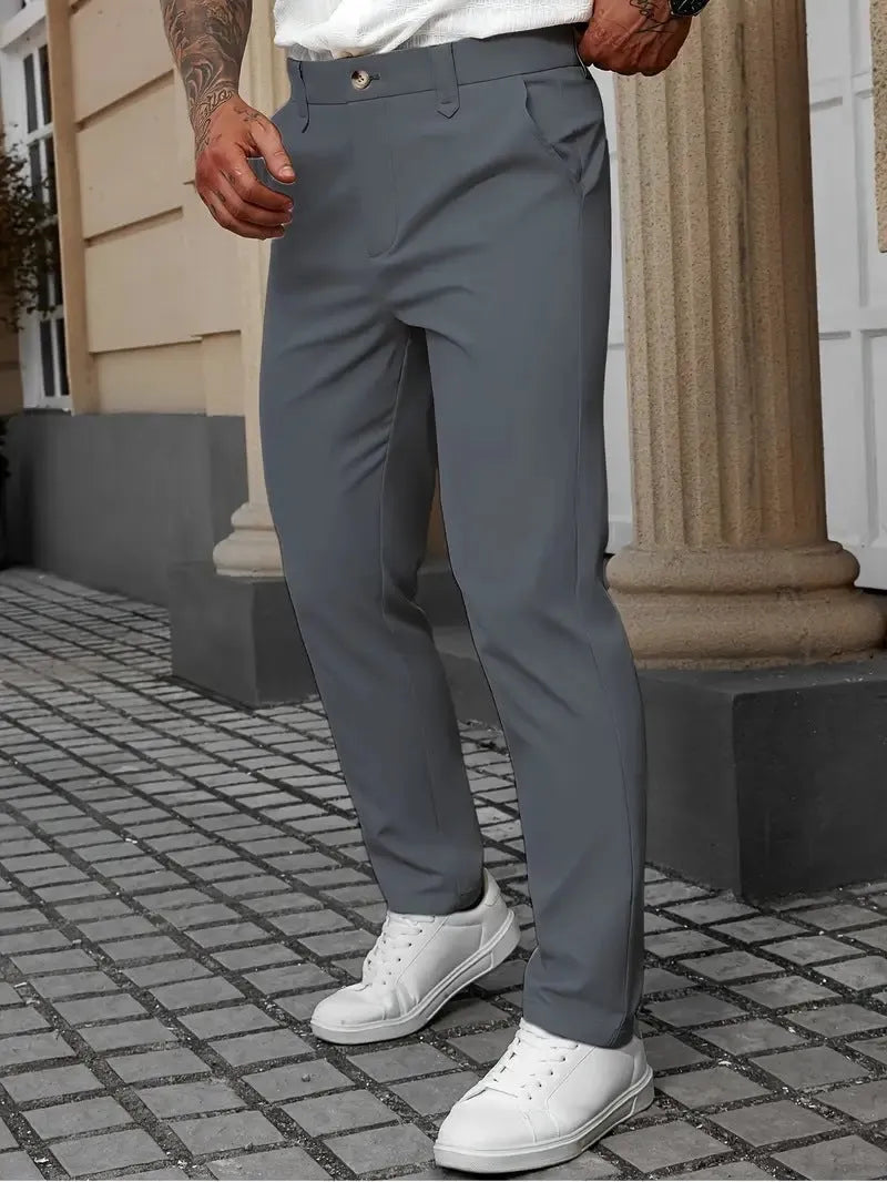 Men's straight-leg business casual trousers in apricot colour on a hanger.