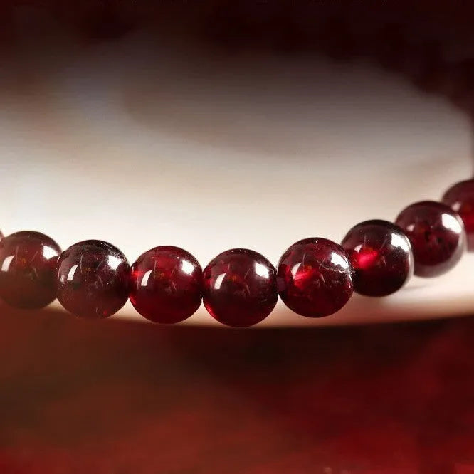 Chinese-style gourd bracelet with imitation garnet beads and Fu character symbols on U-shaped electroplated setting
