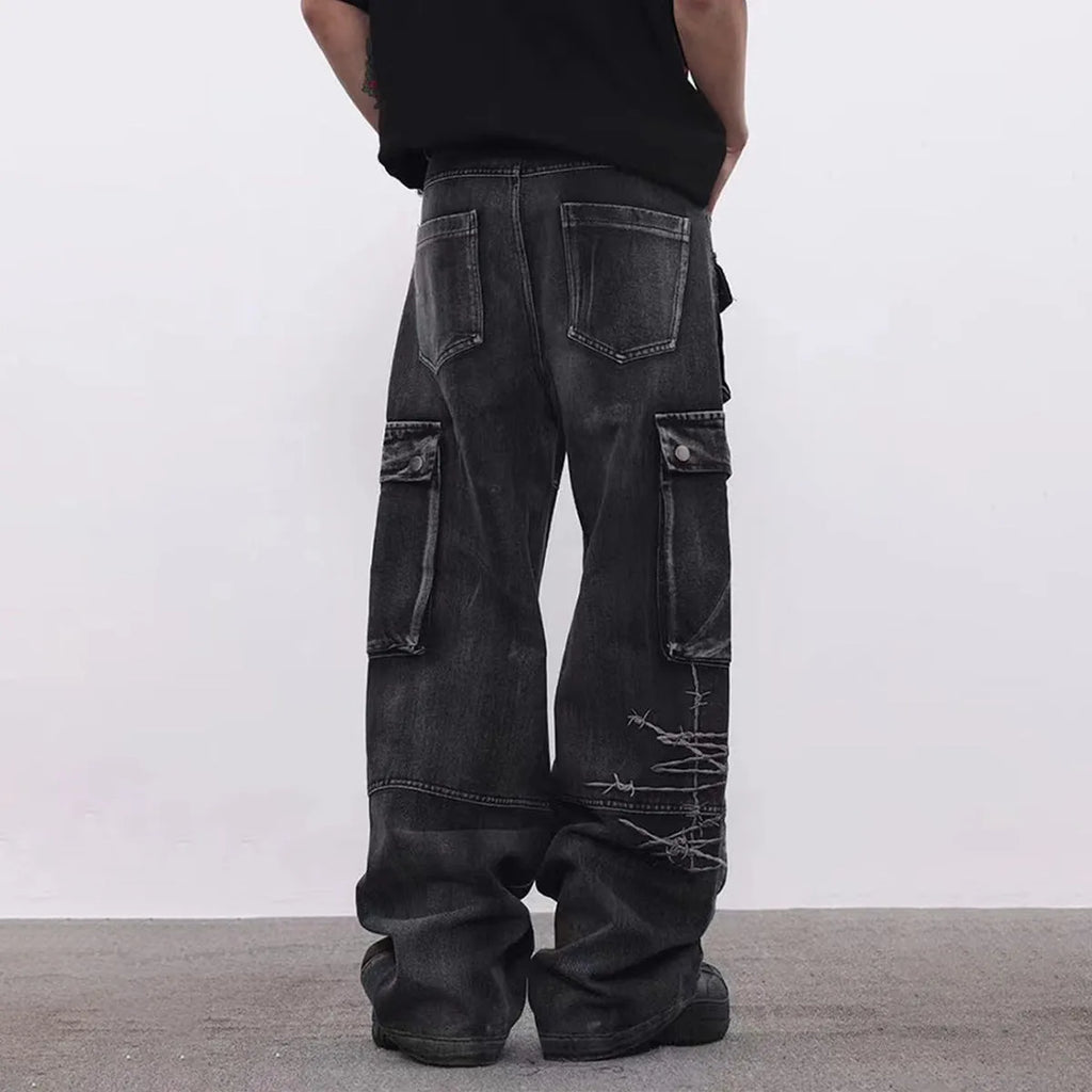 Men's black cotton wide-leg trousers with embroidery detailing and mid waist design