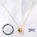 A natural stone beaded necklace and matching bracelet set displayed together, showing varied bead colours.