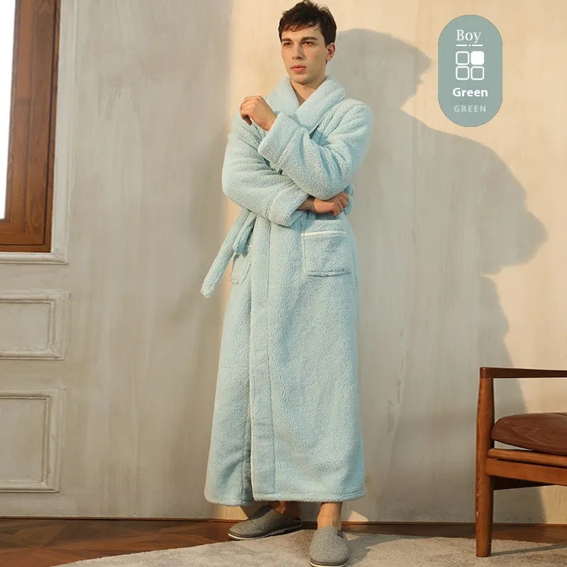 A man and woman wearing matching heavyweight navy blue flannel bathrobes, a couple's winter nightgown set.