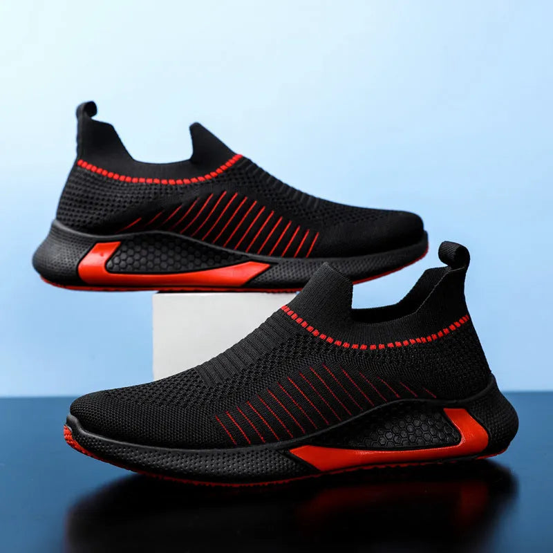 Men's black and white striped mesh slip-on sneakers with flyknit upper and lace-up front