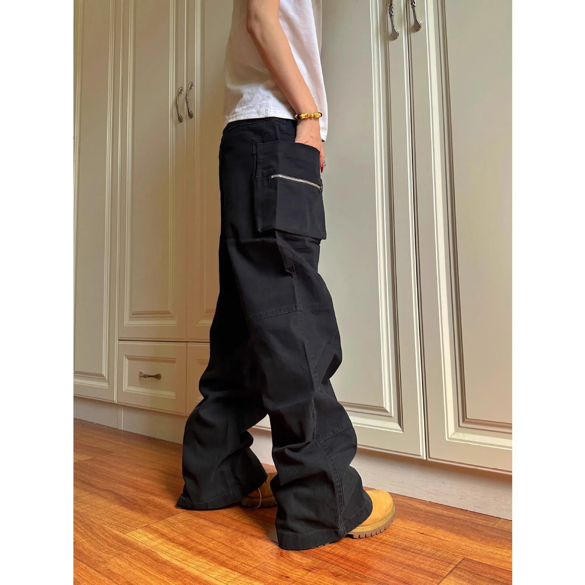 Green double zipper cotton workwear casual pants with a pocket, shown in mid-waist overalls style.