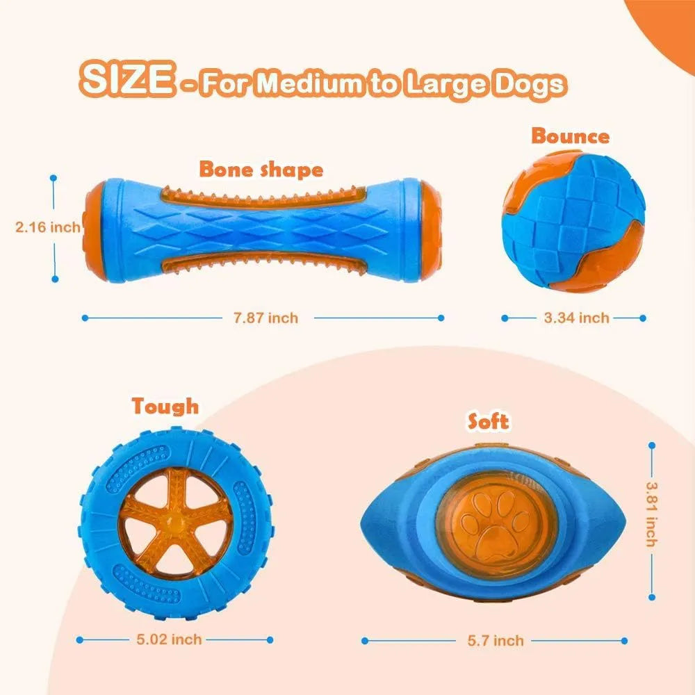 Set of four squeaky dog toys: a blue ball, a red barbell, and two orange tyres, shown on grass.