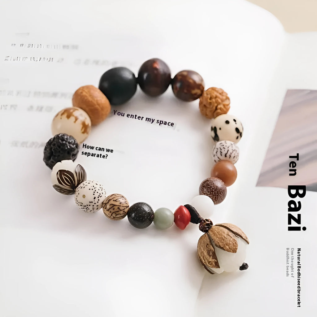 Women's 18-seed Bodhi bead bracelet with elastic cord and geometric design