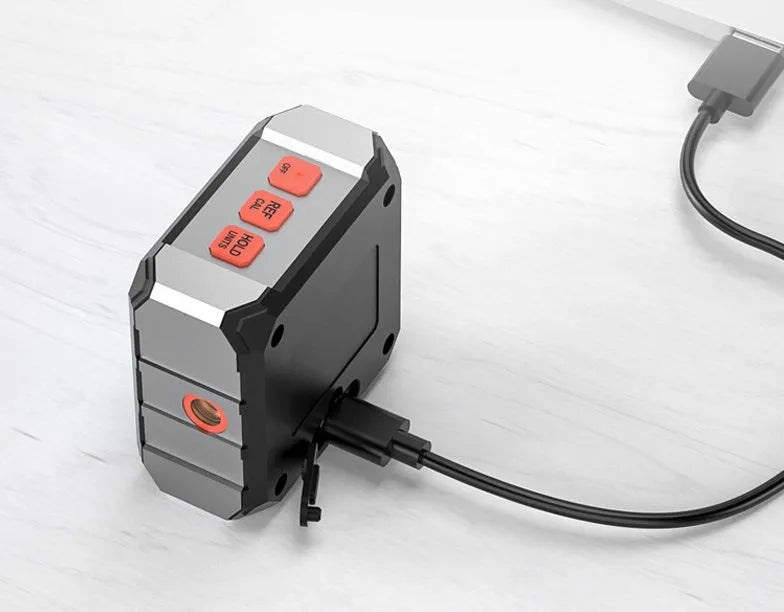 Longyun digital laser tape measure with black alloy casing, backlit display, and magnetic strips on the back.