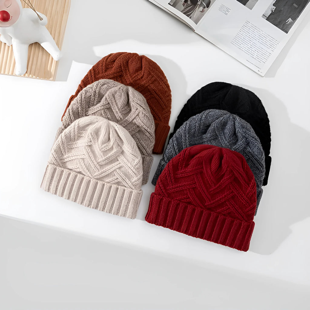 Wool knitted dome crown winter hat in assorted colours featuring a totem pattern.