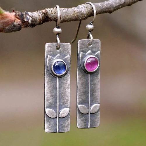 Antique finish red sapphire geometric earrings with retro style and elliptical design elements