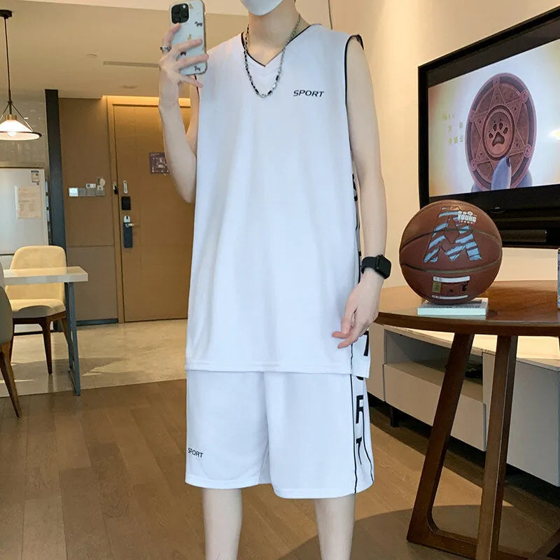 Light grey polyester basketball vest and shorts sports suit laid flat