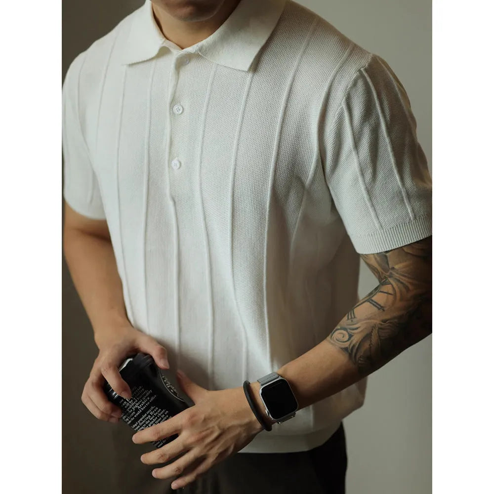 Men's solid colour loose fit polyester t-shirt on a hanger, shown in black and white.