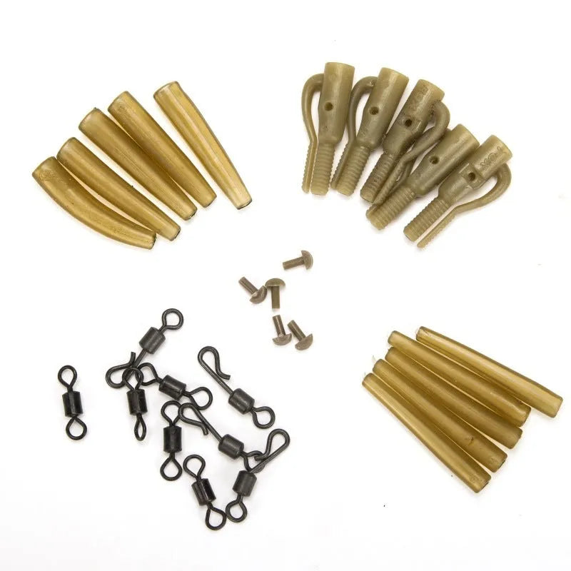 A 30-piece European carp fishing accessory kit containing anti-winding pipes, threaded hose, rotation components, and screws.