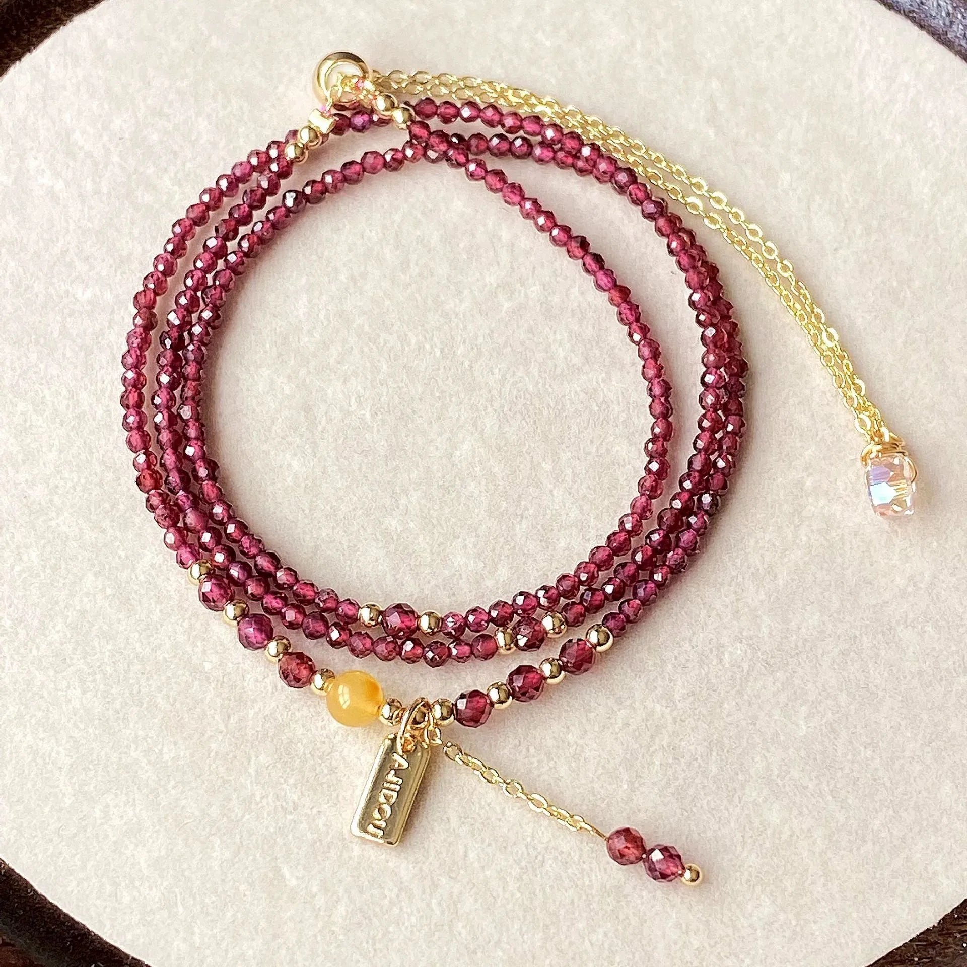 Garnet three circle bracelet with beeswax cut surface and electroplated finish
