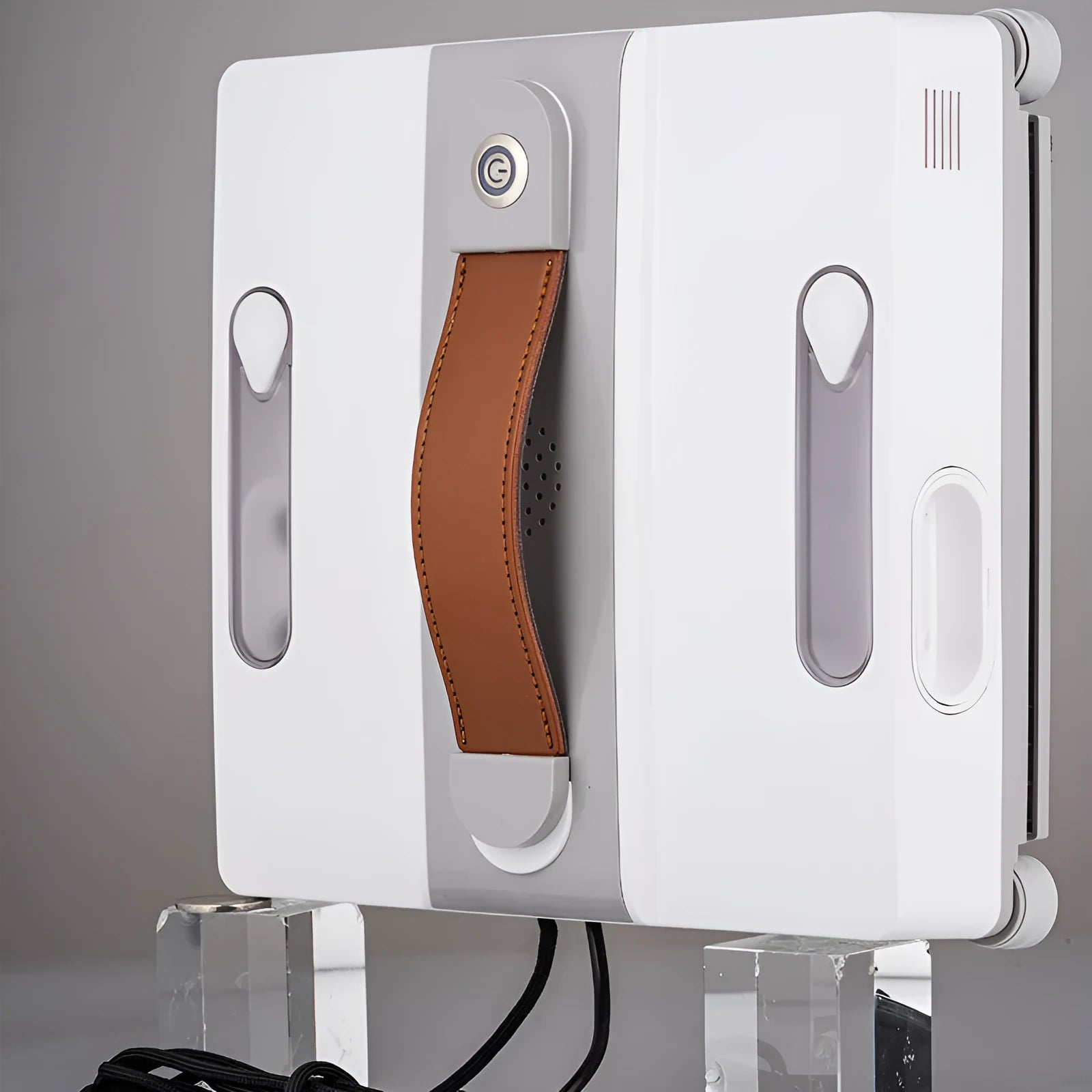 White intelligent window cleaning robot device for automated high-rise window washing.