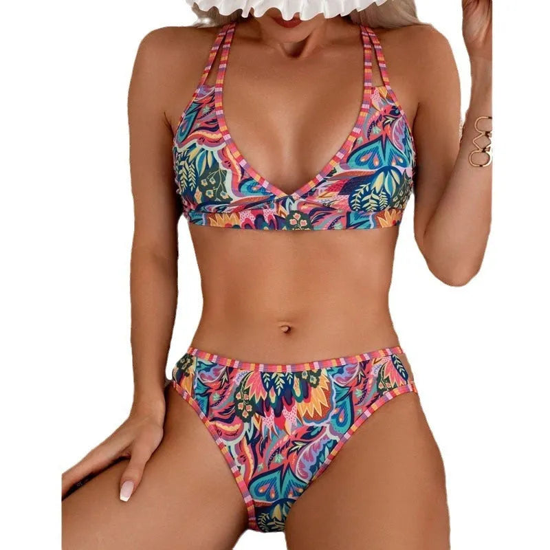 Women's printed halter neck beach swimsuit with high-cut leg, shown as separate top and bottom pieces.