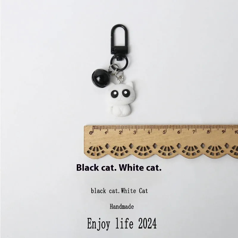 Cartoon little black cat key chain pendant on handbag, plastic resin decoration