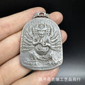 Antique-style iron pendant with Chinese geometric design, a hanging metal ornament.