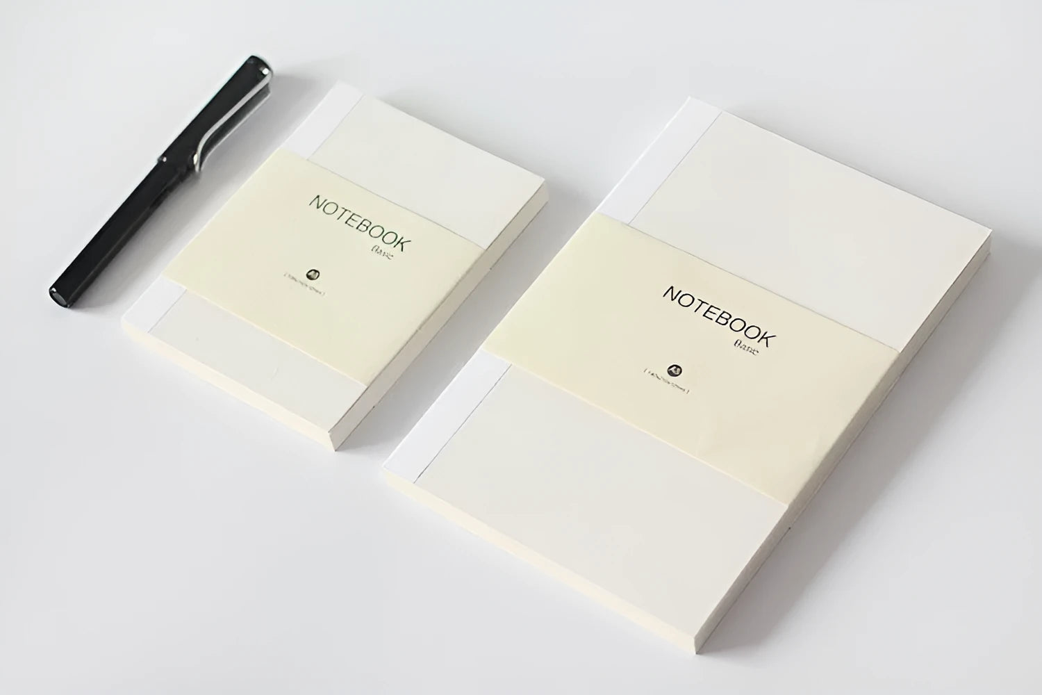 Basic fixed page refill diary notebook with 80 sheets of 100g Dowling paper, shown in blank, lined, and checkered styles.