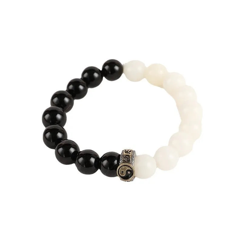Black and white Tai Chi bracelet with obsidian beads and mantra charm