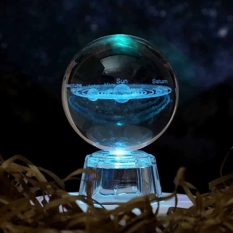 Transparent 6cm crystal ball ornament with inner carving on a fixed base, modern minimalist decor.