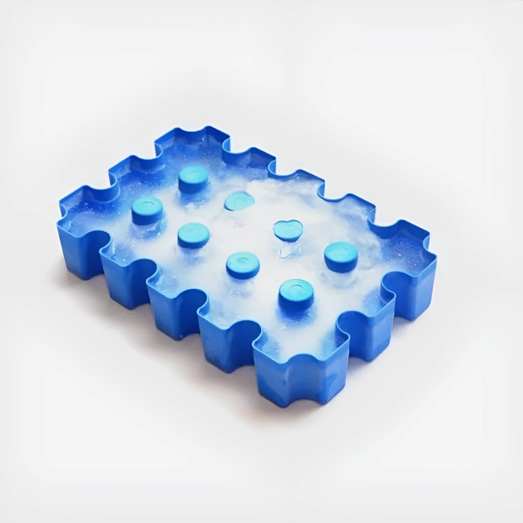 Blue polypropylene ice maker tray measuring 34cm long for outdoor camping and barbecues