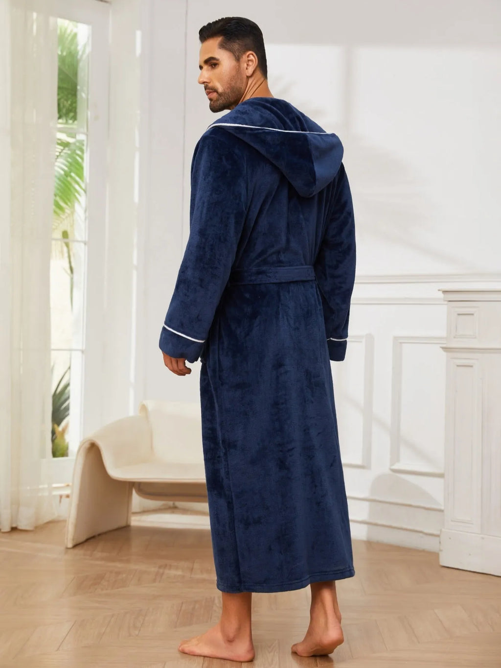 Men's grey flannel bathrobe with front tie belt, shown folded, for winter loungewear.