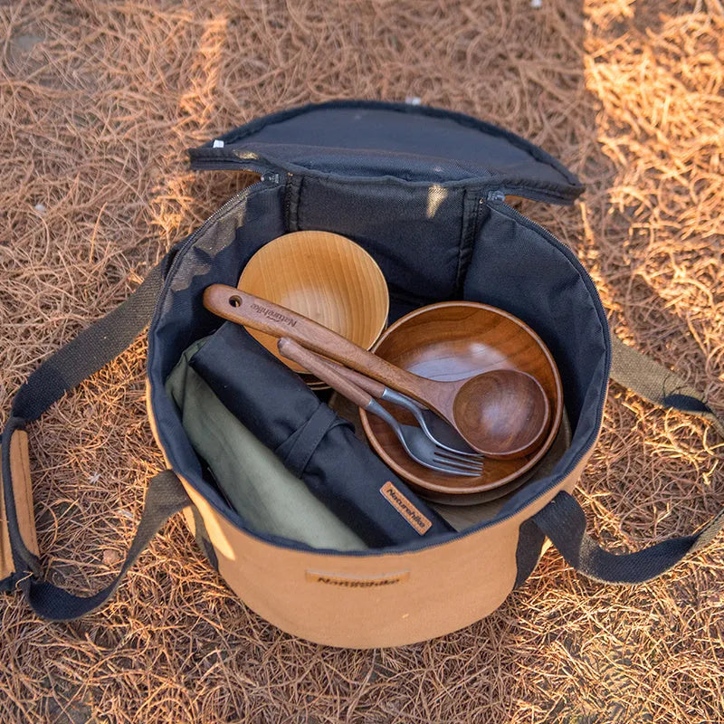 Thickened canvas camping storage bag in barrel design, large size, with blue trim and carry handles