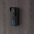 Waterproof smart HD visual doorbell with a rechargeable battery on a doorstep.