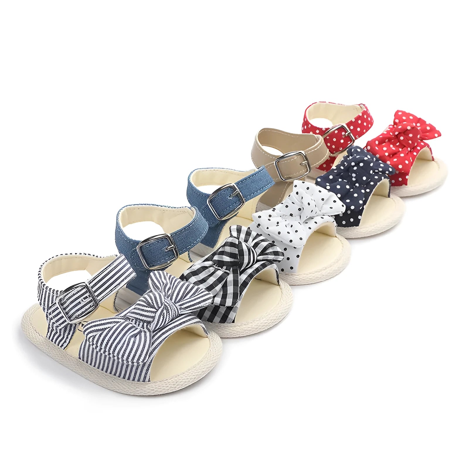 White and black velcro baby shoes showing adjustable straps and low-cut design for toddlers