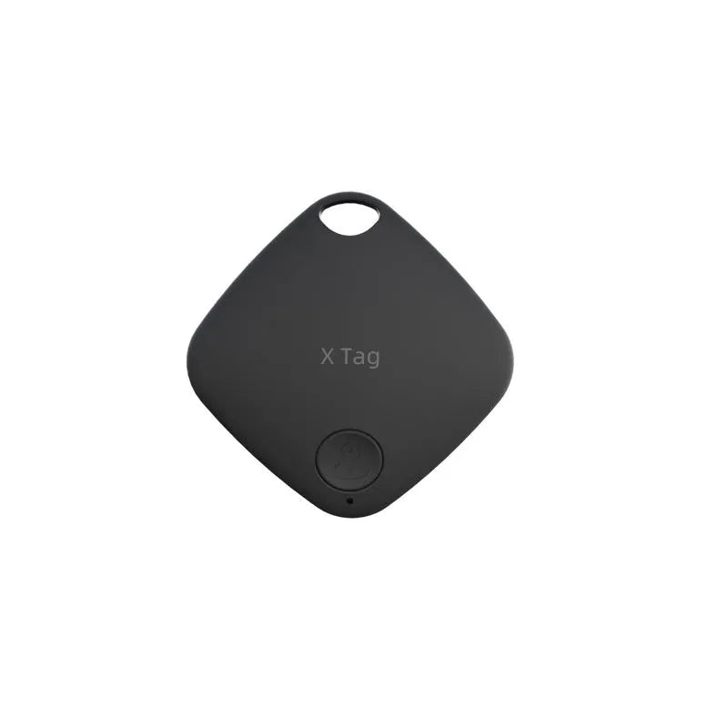 Small black Bluetooth key finder tracker on a keyring next to a smartphone showing location app.