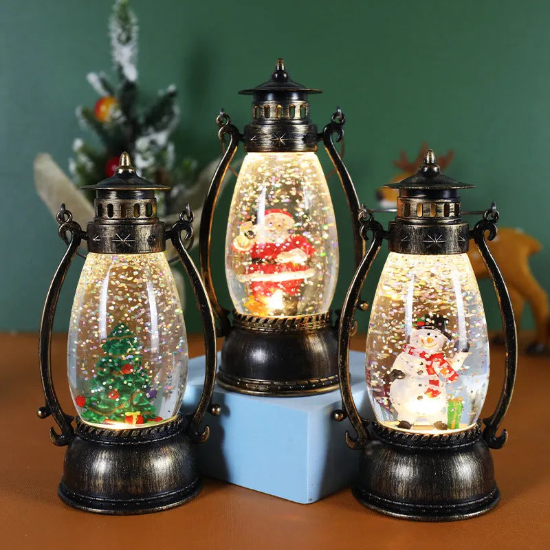 Clear plastic crystal ball LED portable oil lamp with a decorative snowman figure inside on a table.