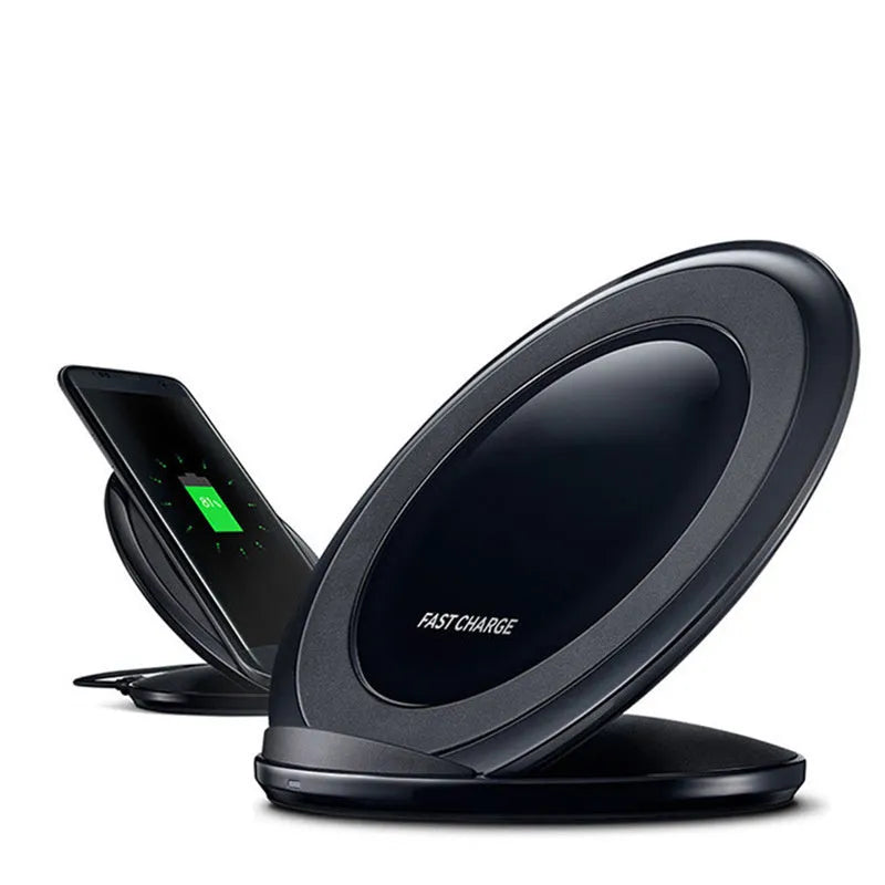 Black and white Qi wireless fast charging pad compatible with Samsung Galaxy Note Edge smartphone.