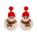 White acrylic snowman bead earrings on a white background, geometric shape, one pair shown