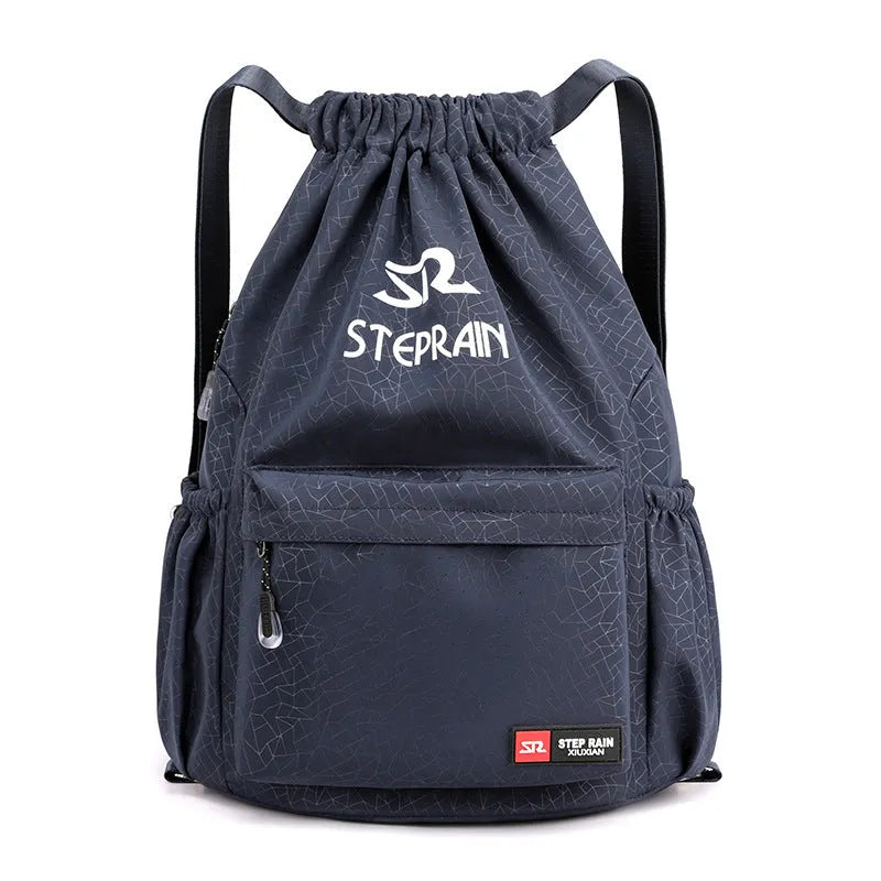 Lightweight solid colour Oxford cloth backpack with drawstring closure and double shoulder straps.