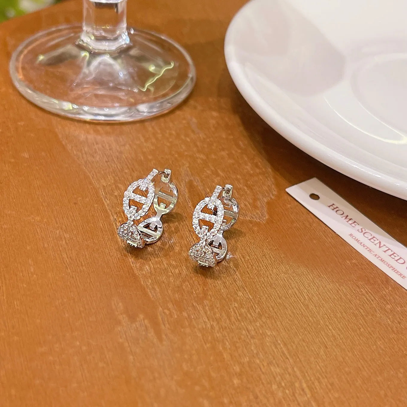 A pair of ladies casual earrings with a diamond design and thick gold plating in silver, gold, or rose gold colour.