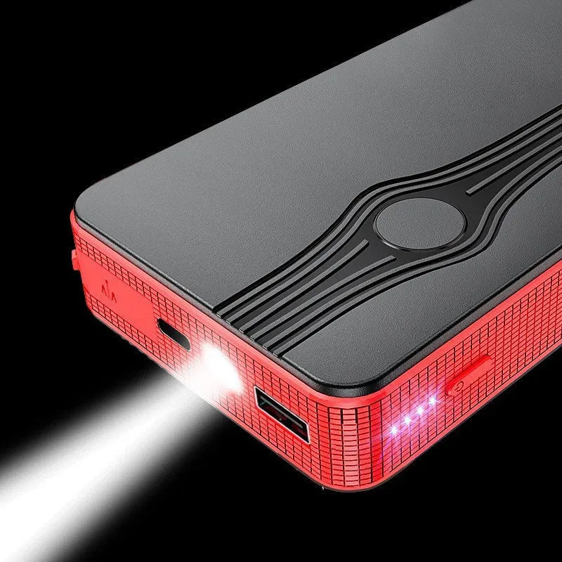 Compact red K4-E car jump starter and power bank with USB port and display.