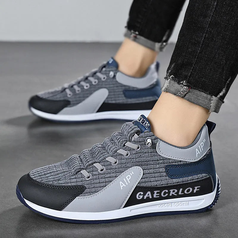 Men's green and grey mesh running shoes with low-top design and lace-up closure