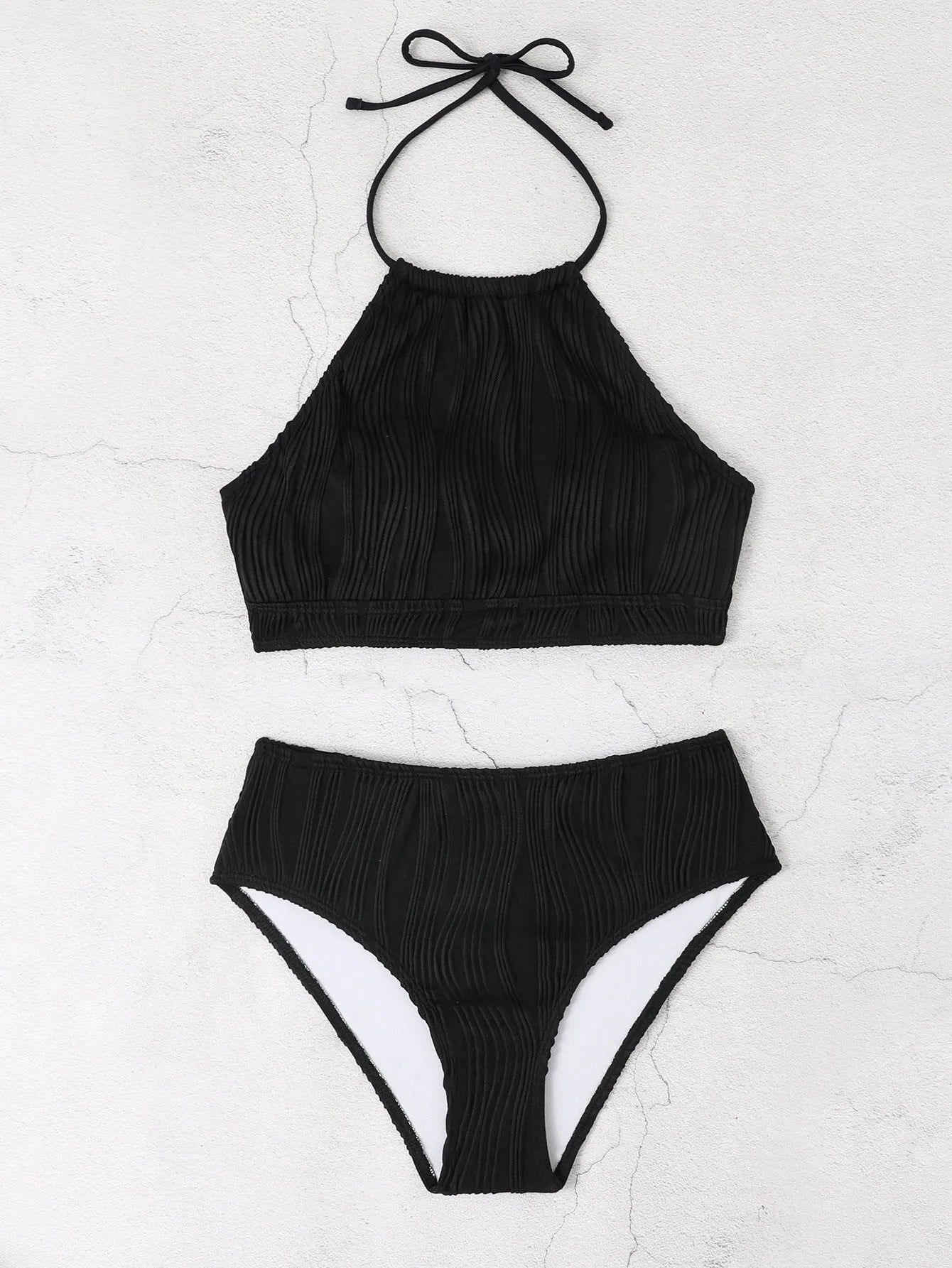 Conservative high-waist apron-style one-piece women's swimsuit in solid colour.