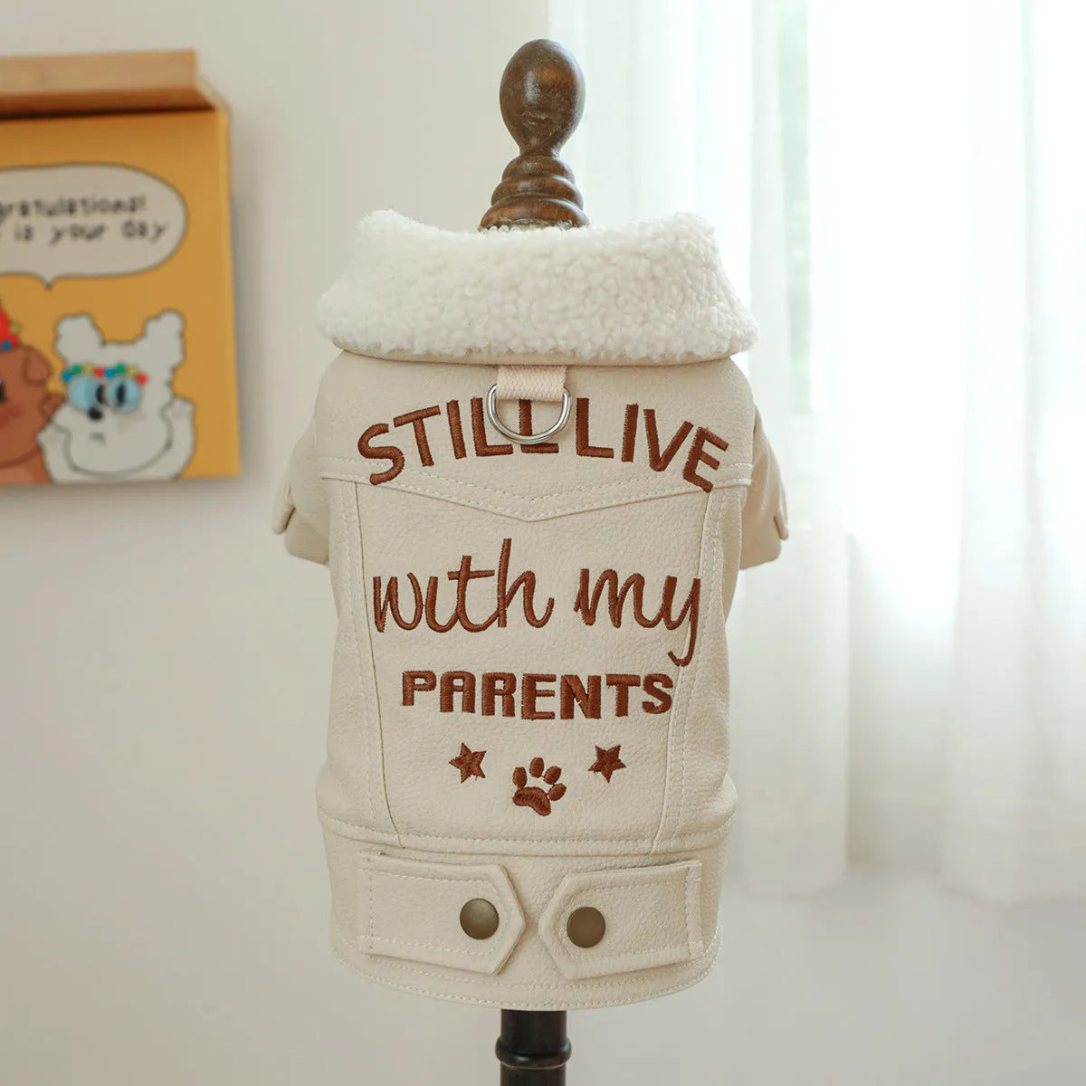 Beige fleece lined padded dog coat in large fur coat style on a mannequin, size label shown.