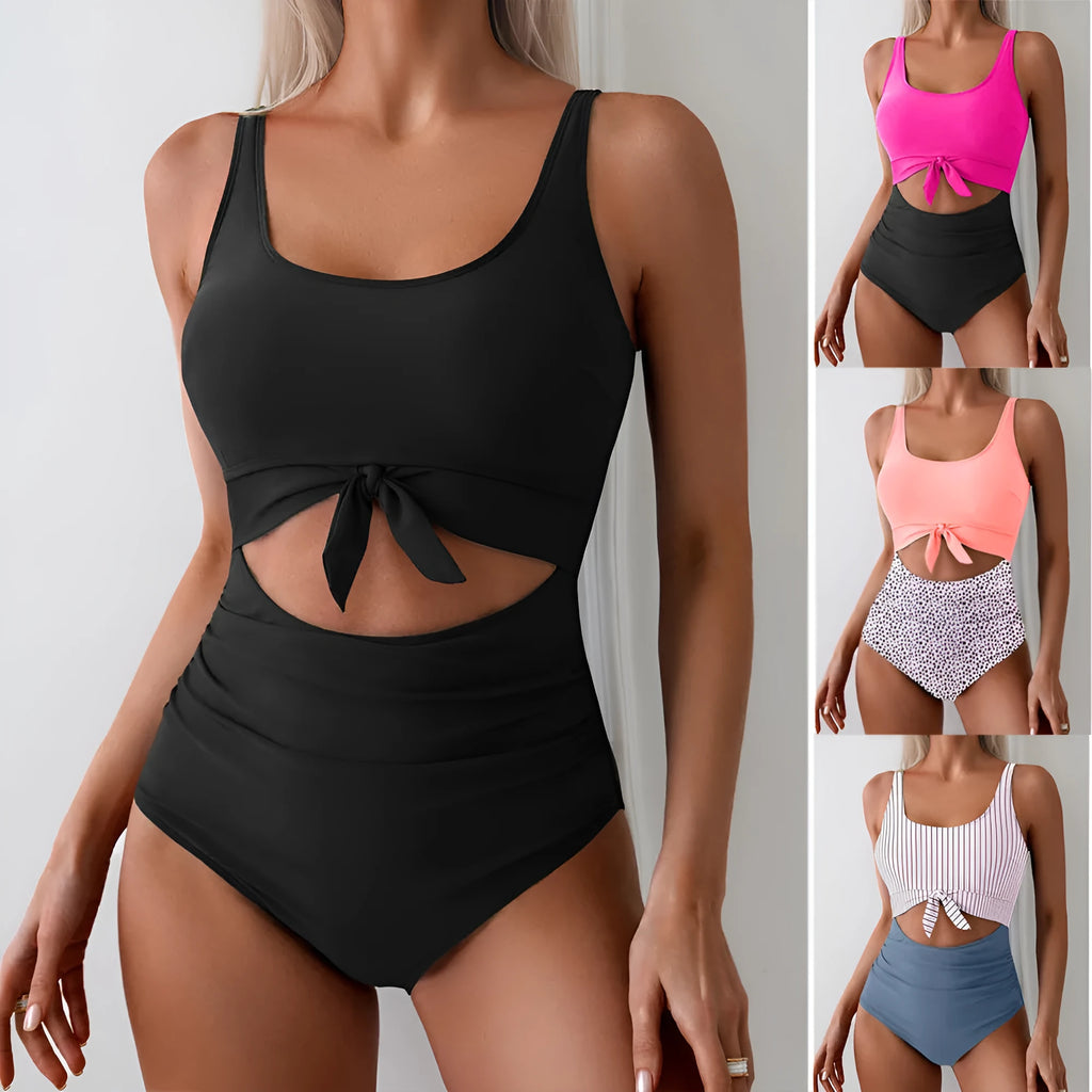 One-piece female swimsuit with contrast colour straps and covered belly in rose-red and black