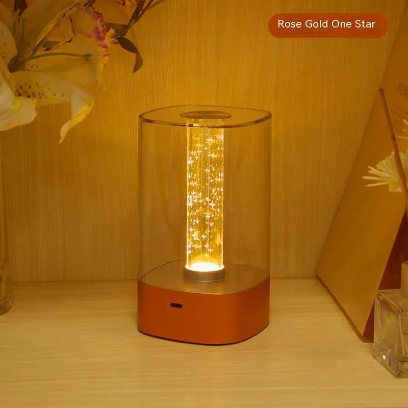 Rose gold USB touch control LED atmosphere lamp with abstract design on wooden surface