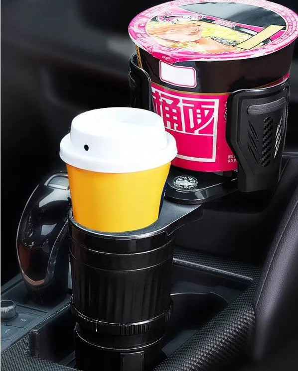 Black retractable car cup holder with adjustable base on a flat surface