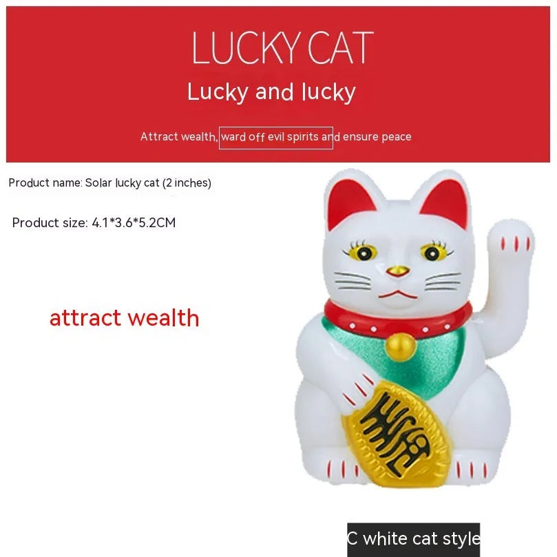 Solar-powered Maneki Neko waving cat car decoration in yellow on dashboard