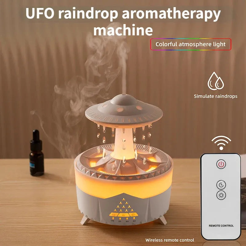 UFO cloud-shaped humidifier with LED lights and water droplet effects on dark surface
