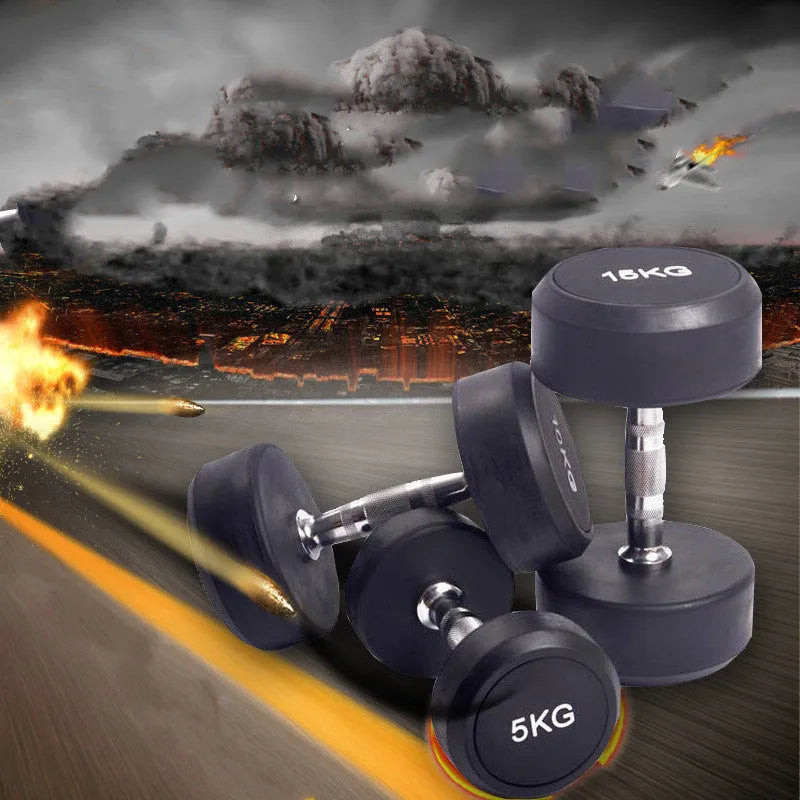 Black rubberized cast iron round head dumbbell on floor, available in 1kg 2.5kg and 5kg weights