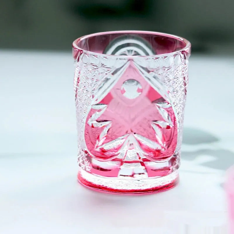Crystal glass hand carved golden red owl wine glass with 201-300ml capacity on a table