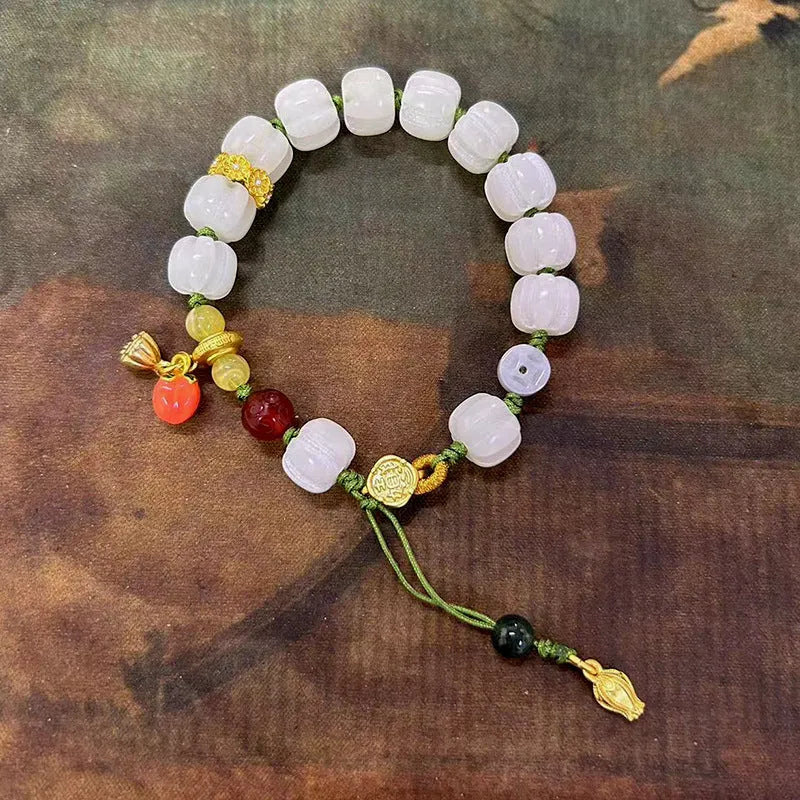 White jade bodhi bracelet with lotus and pumpkin beads on open rope